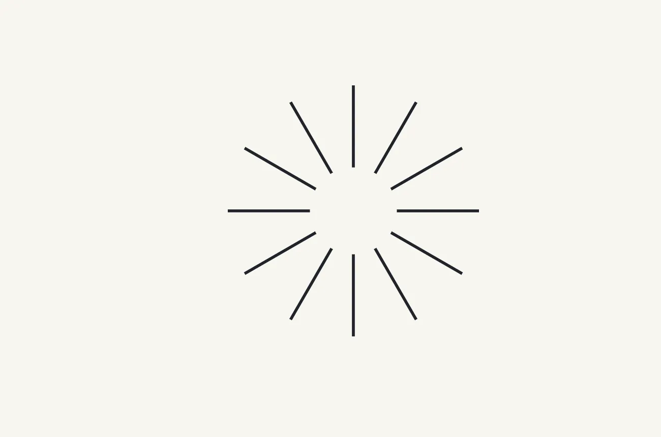 Twelve ink lines radiating from the center on a paper-colored background. Nothing is drawn in the middle.